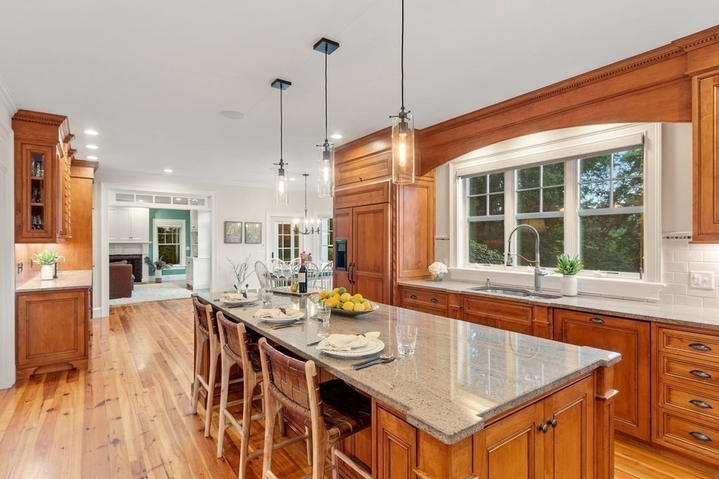 95 Westford Road Concord, MA 01742 - Photo 11 of 42 a dinning table and chairs in the kitchen
