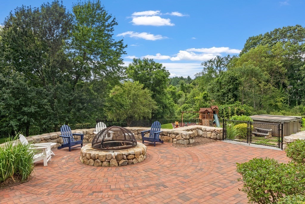 95 Westford Road Concord, MA 01742 - Photo 15 of 42 a view of a patio with table and chairs and potted plants