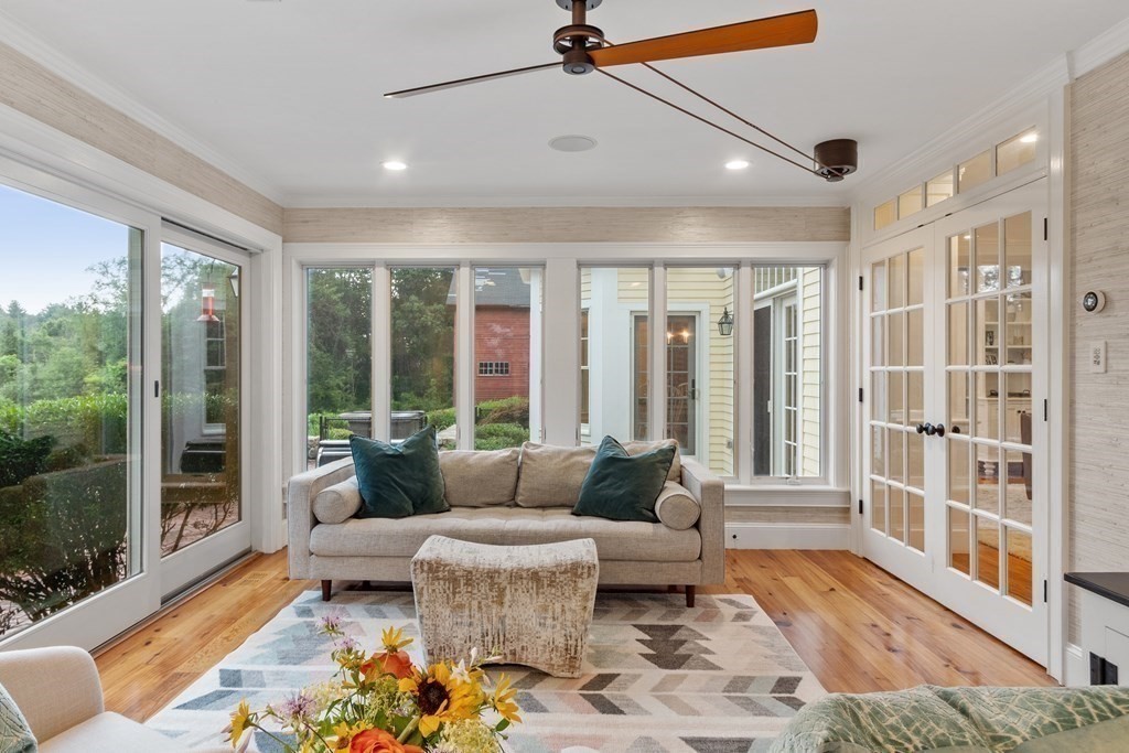 95 Westford Road Concord, MA 01742 - Photo 16 of 42 a living room with furniture and a floor to ceiling window