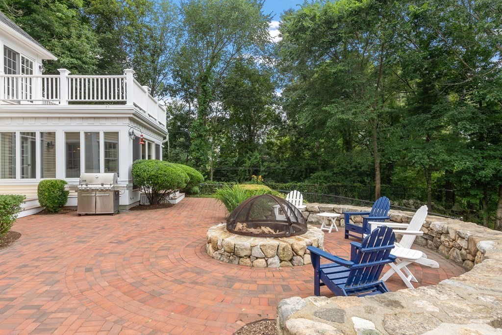 95 Westford Road Concord, MA 01742 - Photo 18 of 42 a view of backyard of house with seating space