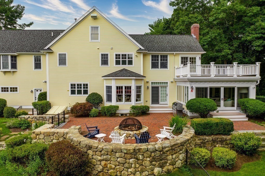 95 Westford Road Concord, MA 01742 - Photo 19 of 42 a front view of a house with yard and green space