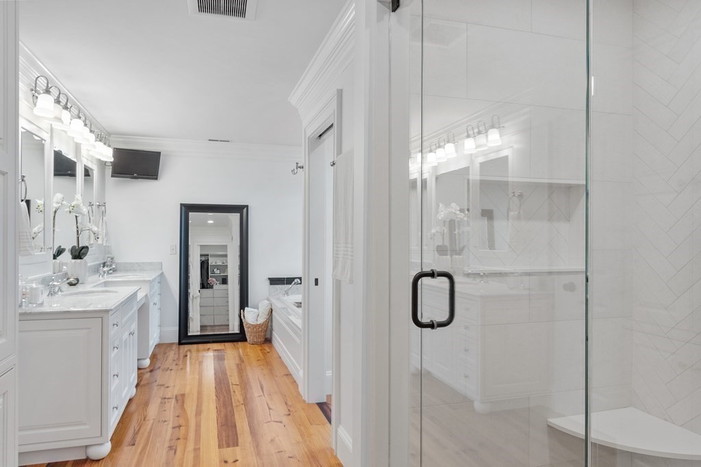 95 Westford Road Concord, MA 01742 - Photo 24 of 42 a bathroom with a shower sink and mirror