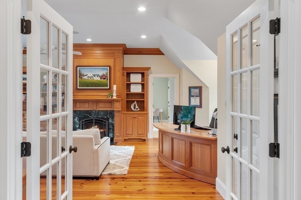 95 Westford Road Concord, MA 01742 - Photo 33 of 42 a living room with furniture windows and wooden floor