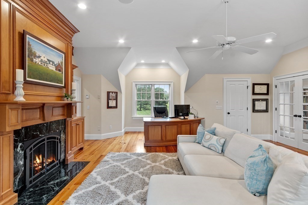 95 Westford Road Concord, MA 01742 - Photo 34 of 42 a living room with furniture fireplace and flat screen tv