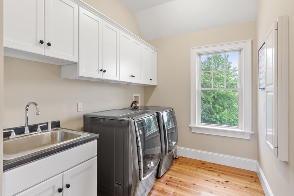 95 Westford Road Concord, MA 01742 - Photo 36 of 42 a utility room with sink dryer and washer