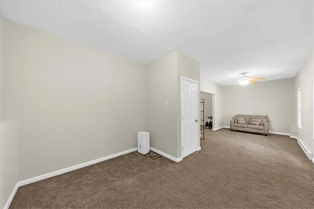 a view of a livingroom with a storage & utility room