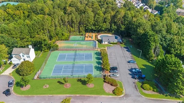 a view of an outdoor space and tennis court