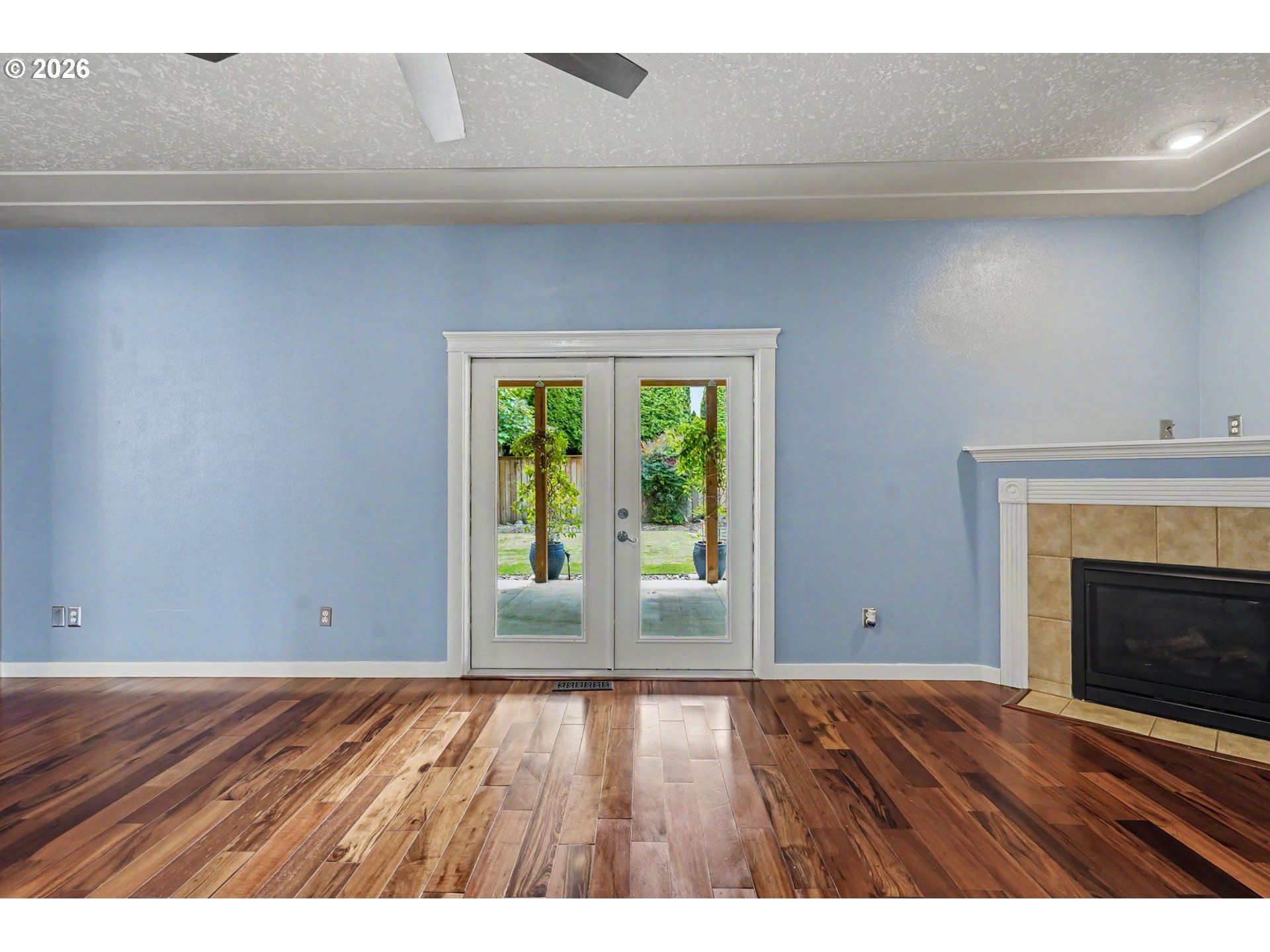 1462 Barnick Road Northeast Keizer, OR 97303 - Photo 11 of 48 a view of an empty room with window and wooden floor