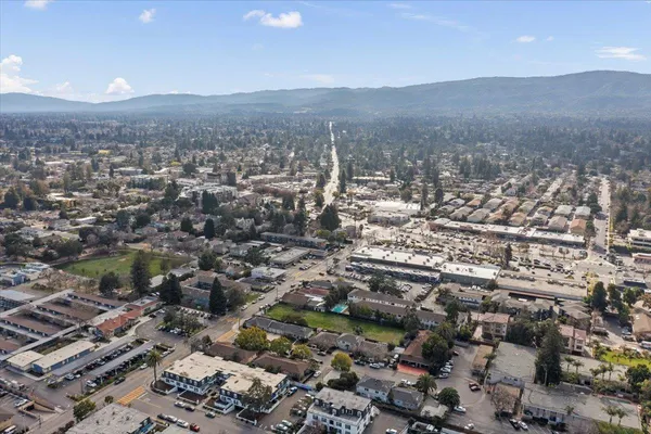 an aerial view of residential house and green space