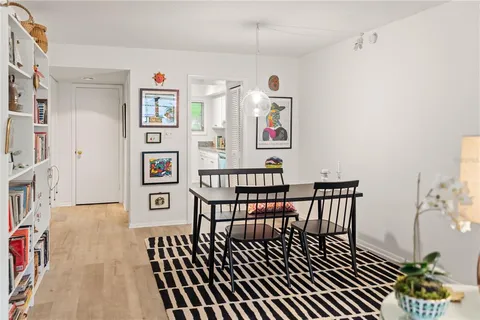 a view of a livingroom with furniture and toys