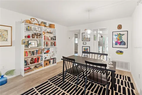 a view of a livingroom with furniture and toys
