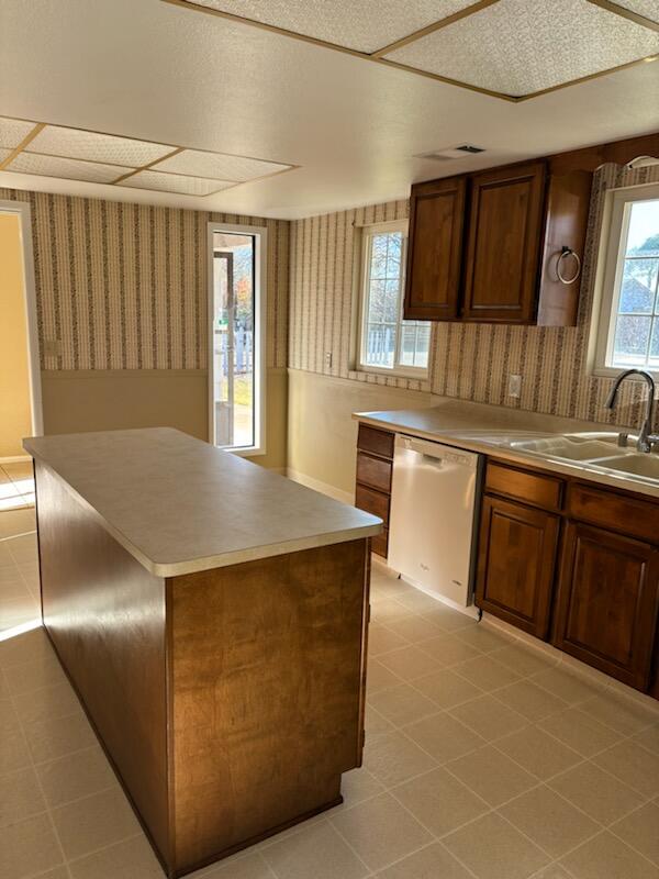 1862 Whaley Road Redding, CA 96003 - Photo 10 of 12 a kitchen with stainless steel appliances granite countertop a sink a stove and a refrigerator