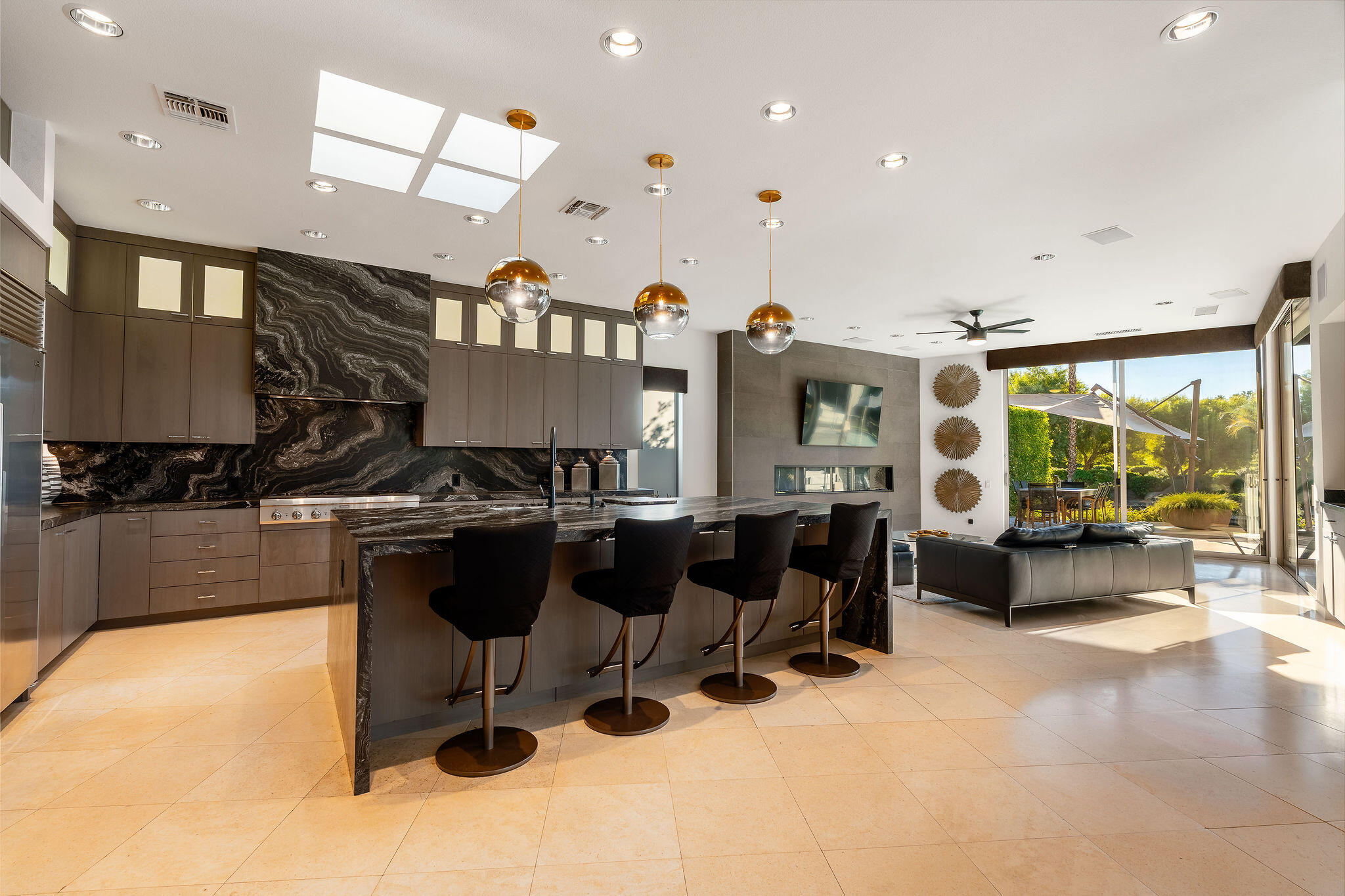108 Waterford Circle Rancho Mirage, CA 92270 - Photo 11 of 41 a living room with lots of furniture and a large window