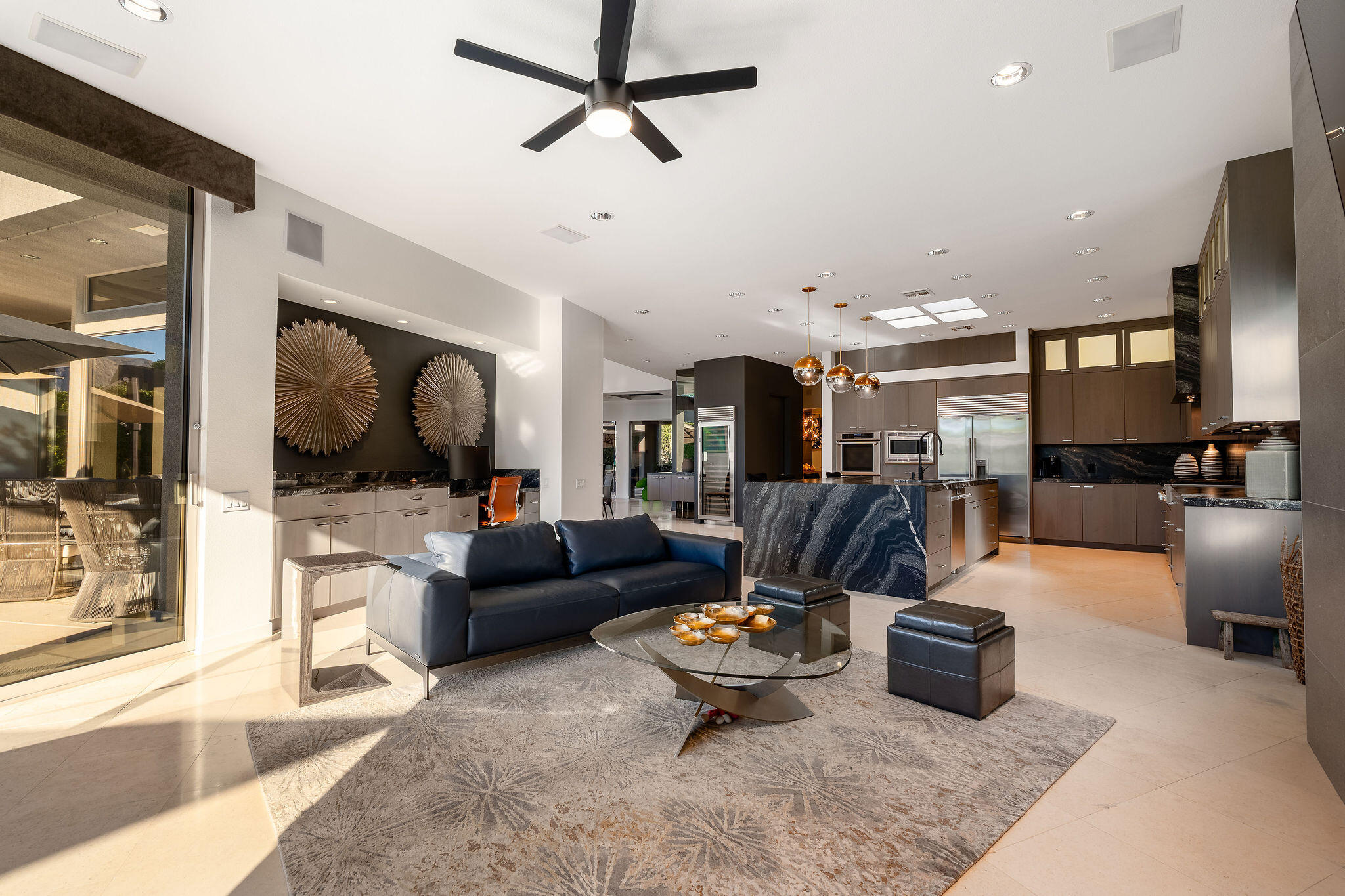 108 Waterford Circle Rancho Mirage, CA 92270 - Photo 16 of 41 a living room with furniture and a flat screen tv