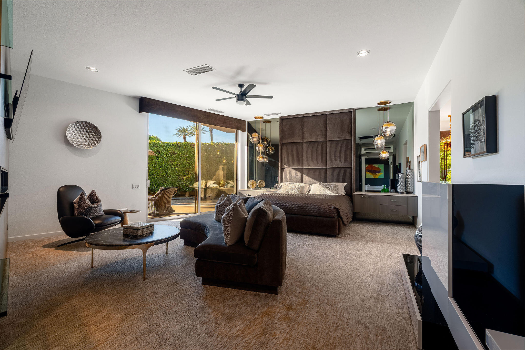 108 Waterford Circle Rancho Mirage, CA 92270 - Photo 18 of 41 a living room with furniture and a large window