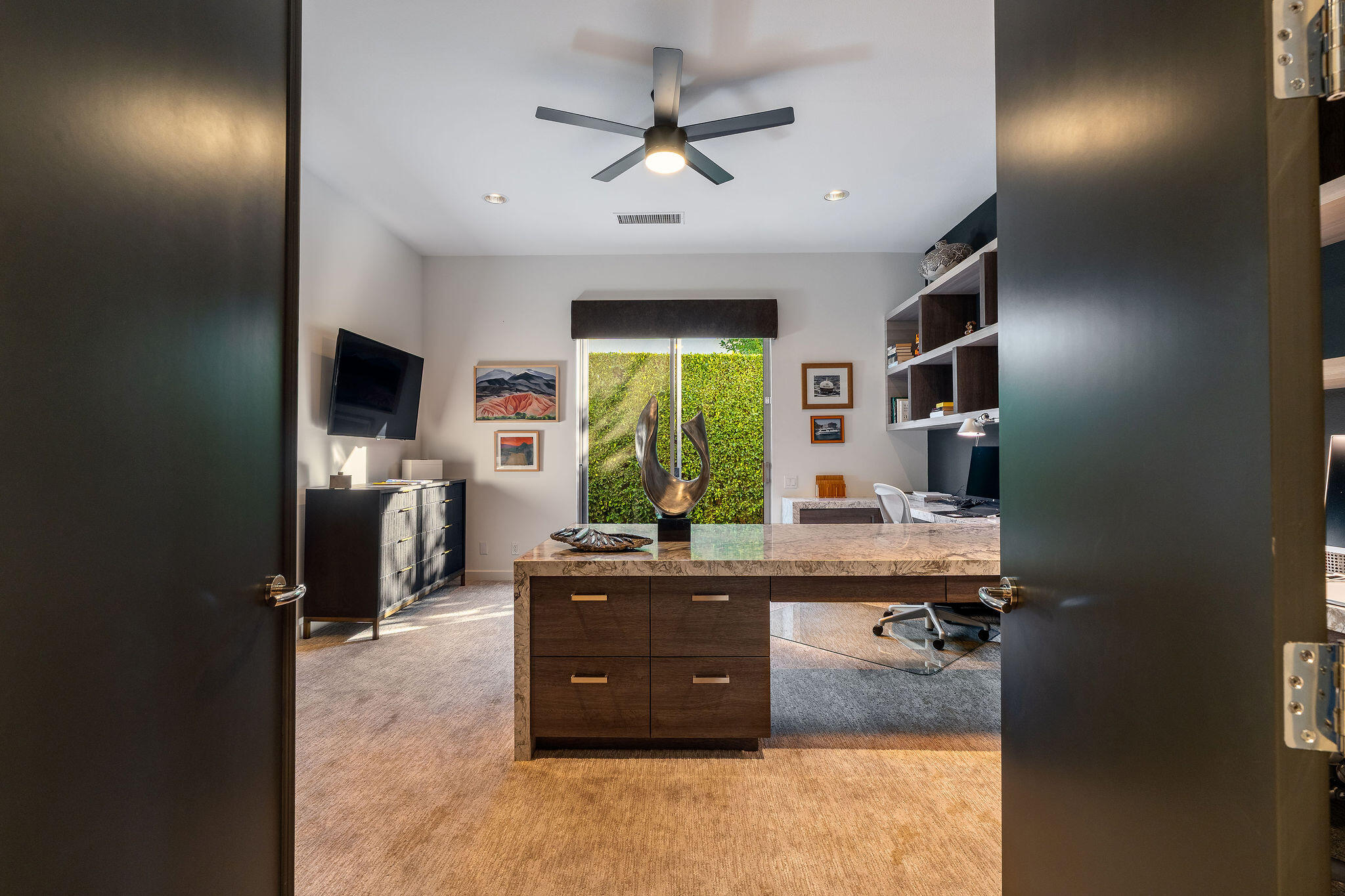 108 Waterford Circle Rancho Mirage, CA 92270 - Photo 26 of 41 a room with kitchen island stainless steel appliances a sink stove and refrigerator