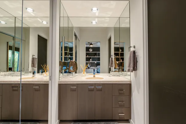 a kitchen with a sink and a refrigerator