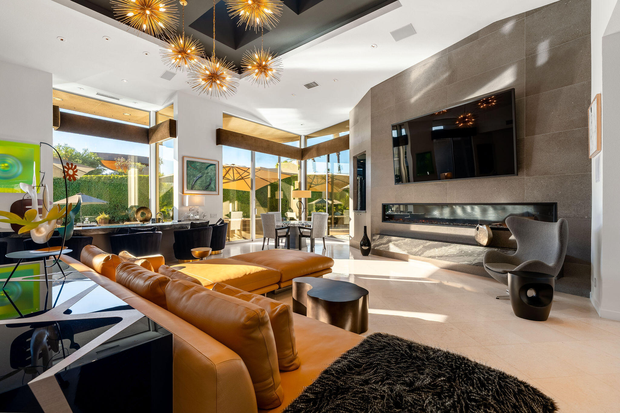 108 Waterford Circle Rancho Mirage, CA 92270 - Photo 3 of 41 a dining room with furniture and a large window