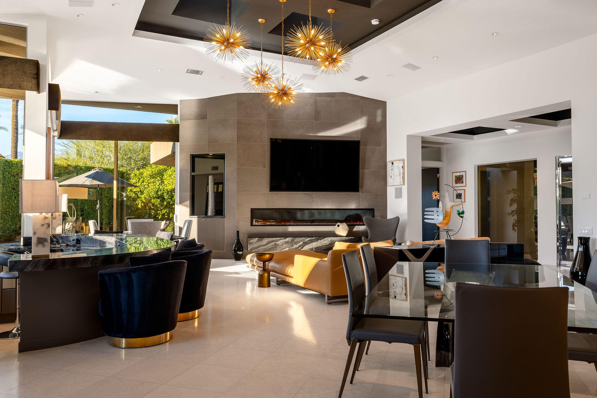 108 Waterford Circle Rancho Mirage, CA 92270 - Photo 7 of 41 a living room with furniture and a flat screen tv