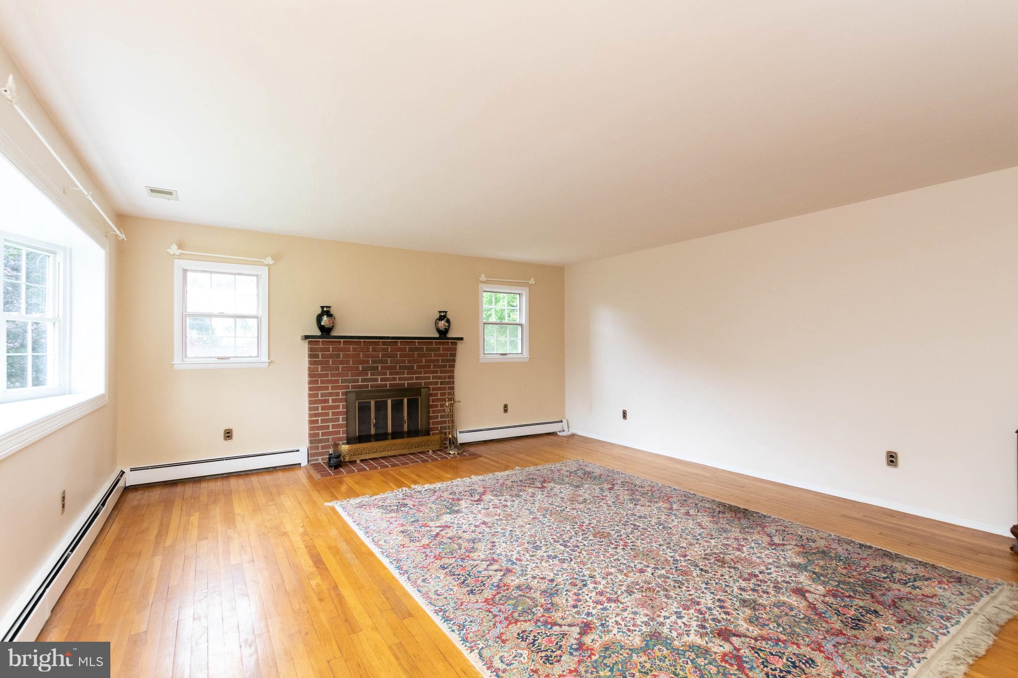 4717 Forge Road Perry Hall, MD 21128 - Photo 10 of 30 Living Room with brick fireplace