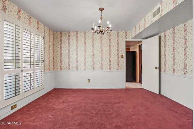a kitchen with stainless steel appliances granite countertop a refrigerator sink and cabinets