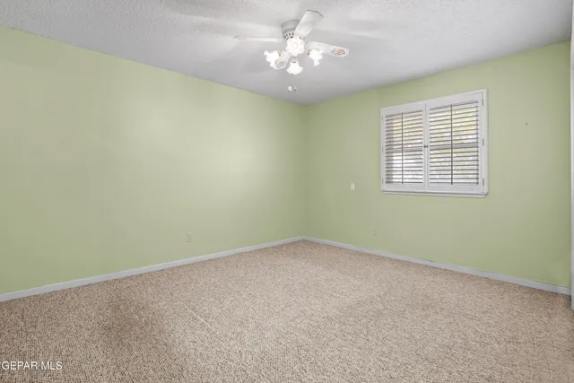 a bathroom with a sink a toilet and vanity