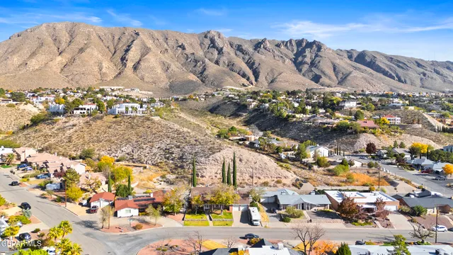 a view of a swimming pool with a lounge chair