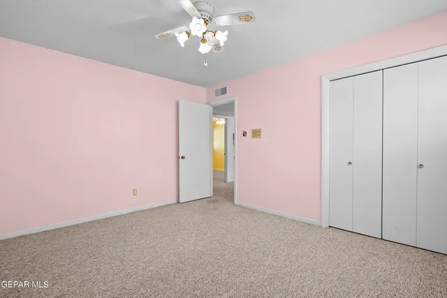 a view of a swimming pool with an outdoor space and seating area