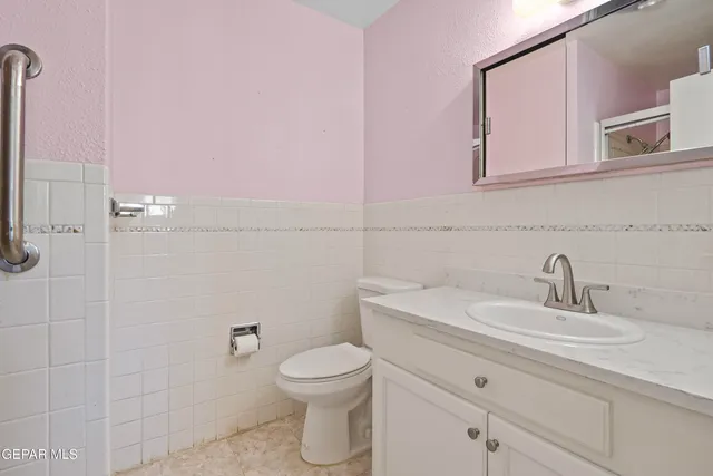 a front view of house with yard swimming pool and outdoor seating