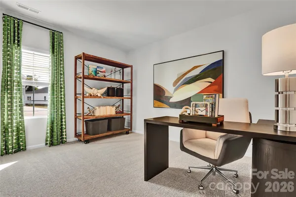 a living room with a couch and a table