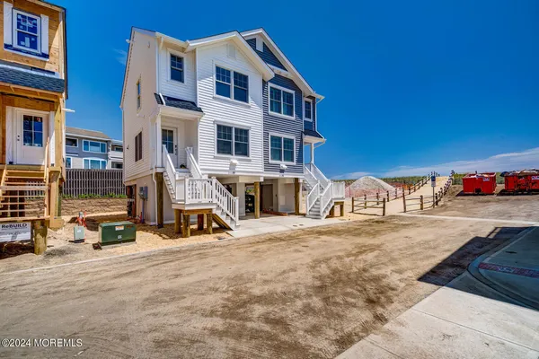 a view of swimming pool with outdoor seating