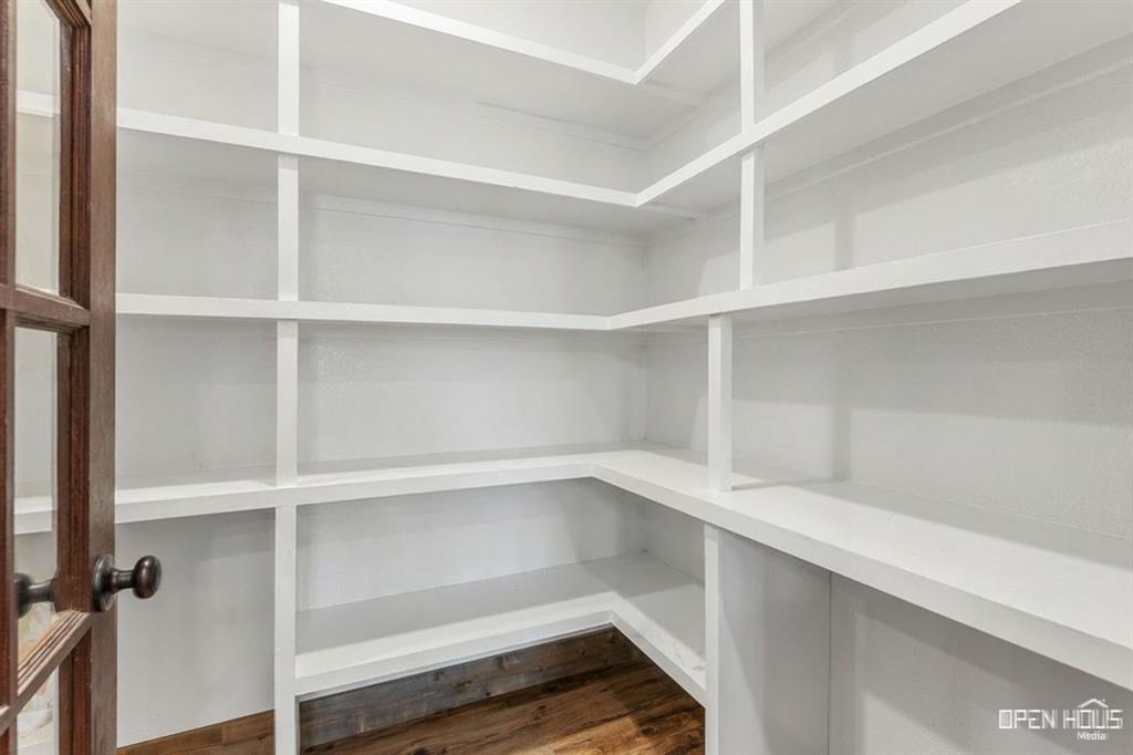 515 Sales Road Windthorst, TX 76389 - Photo 10 of 34 a view of walk in closet with empty racks