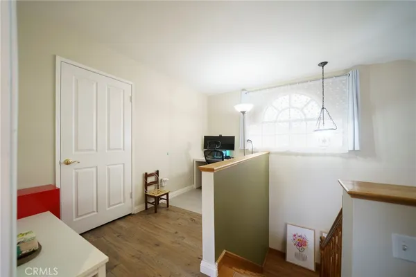 a room with furniture and a window