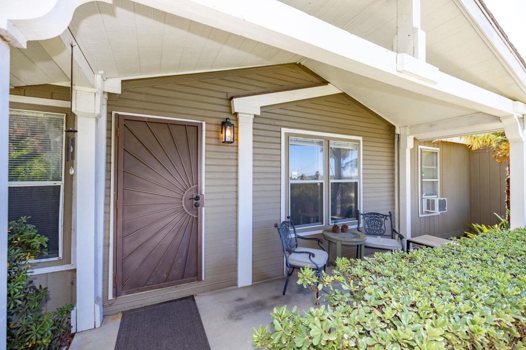 224 Astro Court Vista, CA 92083 - Photo 13 of 47 a front view of a house with garden