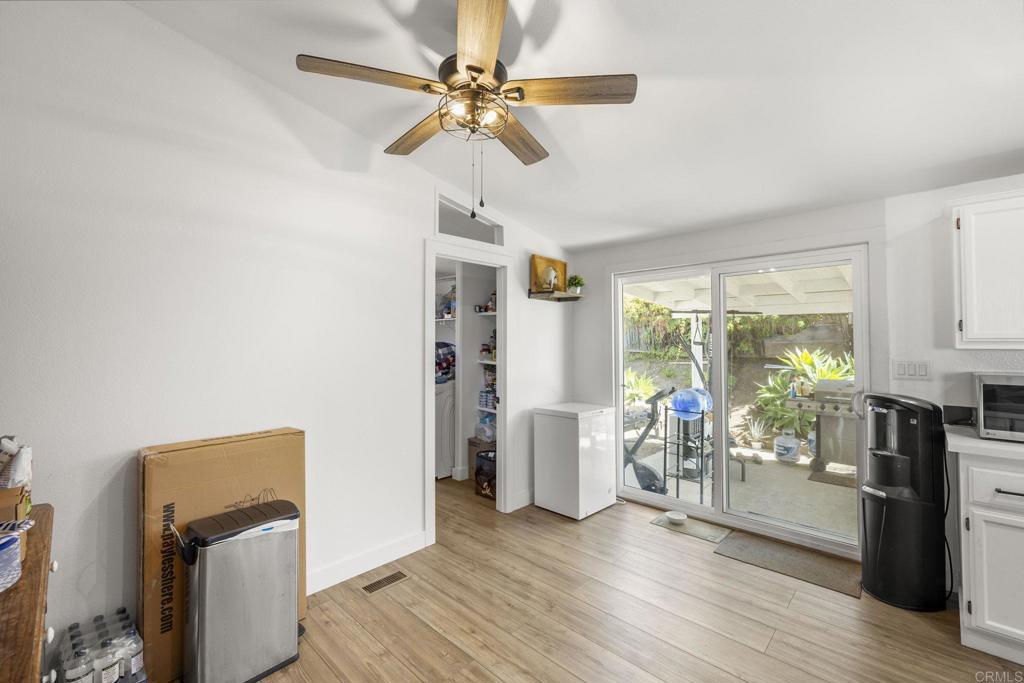 224 Astro Court Vista, CA 92083 - Photo 32 of 47 a view of a livingroom with furniture and a ceiling fan