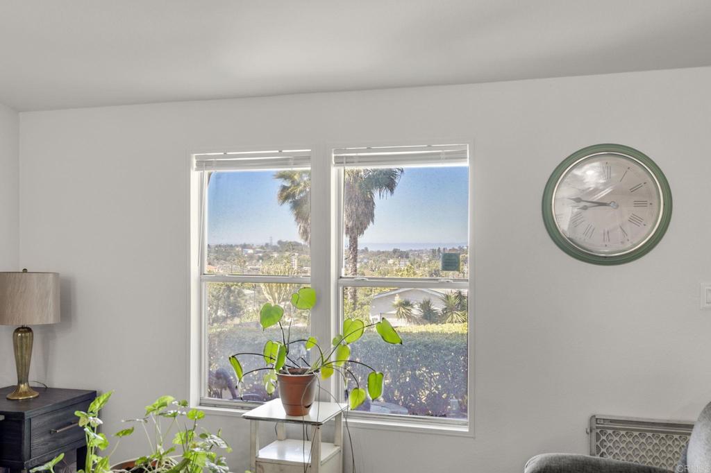 224 Astro Court Vista, CA 92083 - Photo 36 of 47 a view of living room filled with furniture and a window
