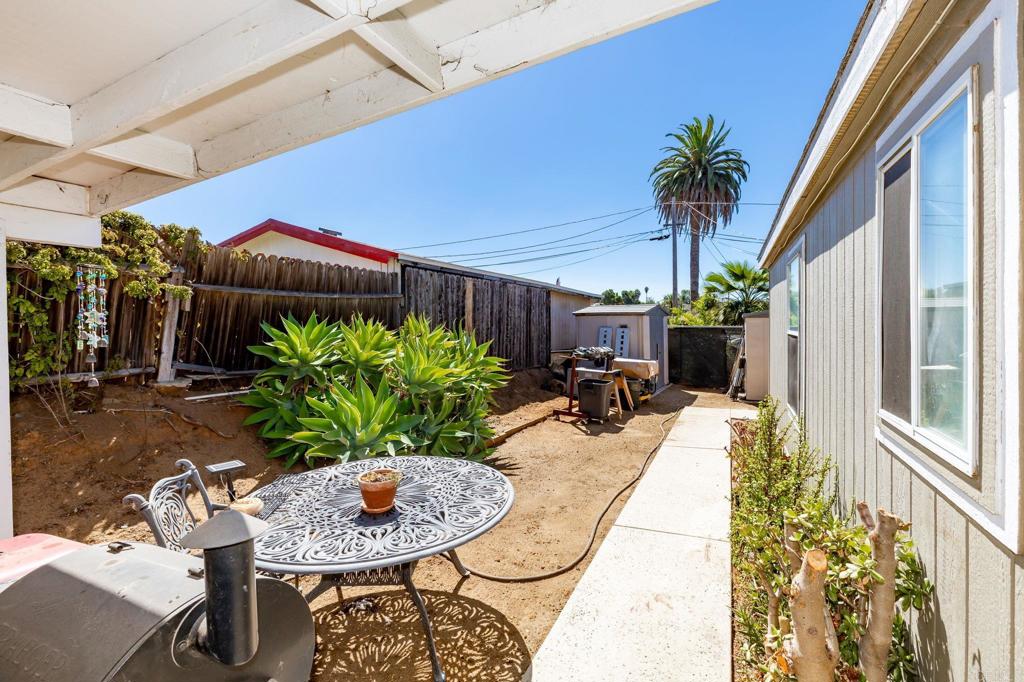 224 Astro Court Vista, CA 92083 - Photo 41 of 47 a view of a porch with furniture and a yard