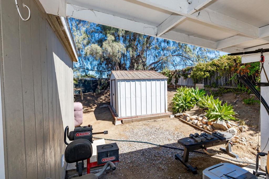224 Astro Court Vista, CA 92083 - Photo 43 of 47 a backyard of a house with outdoor seating