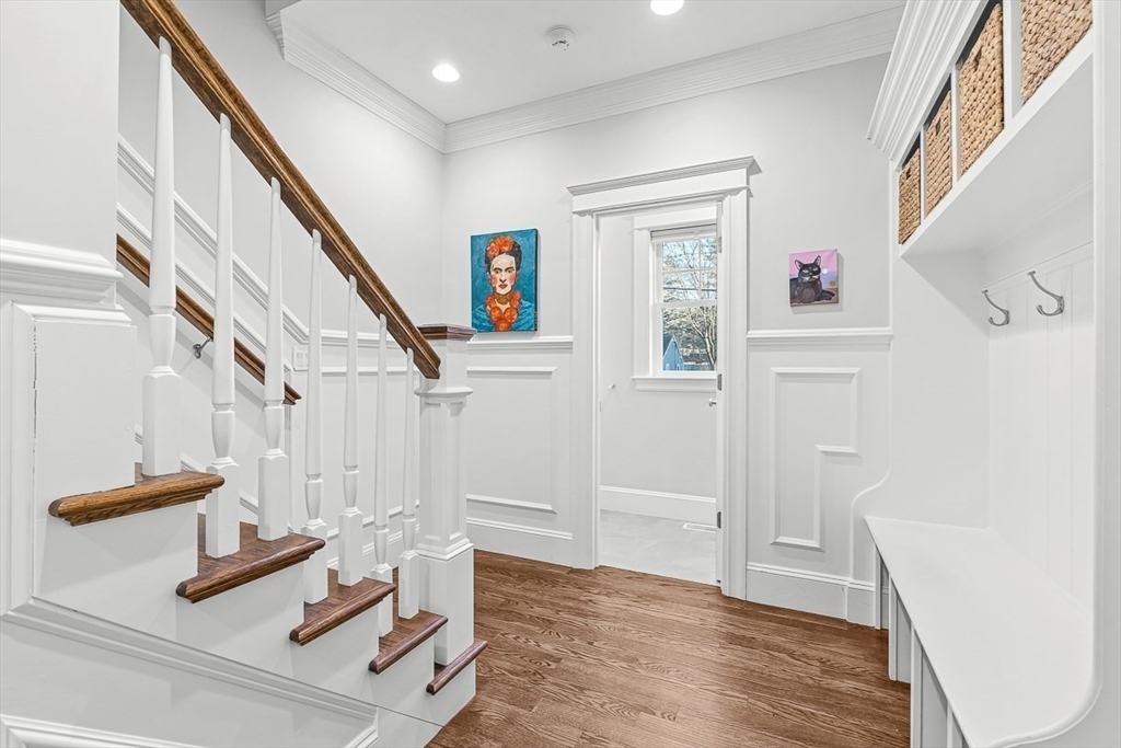 25 Cavanaugh Path Newton, MA 02459 - Photo 13 of 31 a view of entryway with stairs and wooden floor