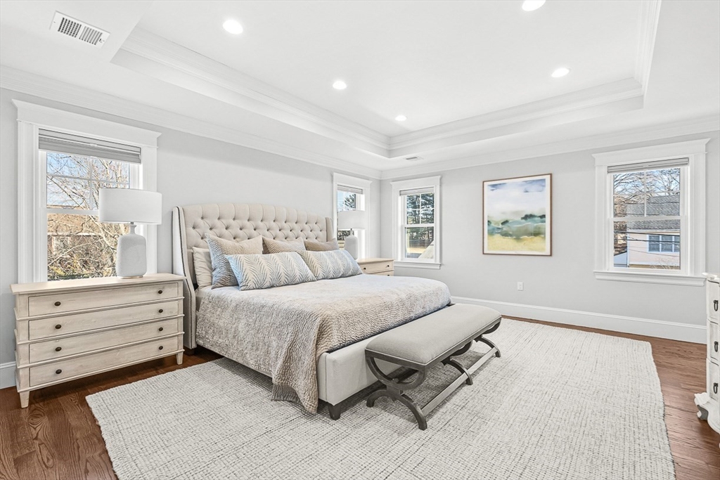 25 Cavanaugh Path Newton, MA 02459 - Photo 15 of 31 a spacious bedroom with a bed and window