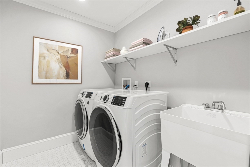 25 Cavanaugh Path Newton, MA 02459 - Photo 23 of 31 a utility room with dryer and washer
