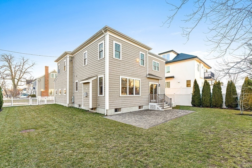 25 Cavanaugh Path Newton, MA 02459 - Photo 28 of 31 a front view of a house with a yard