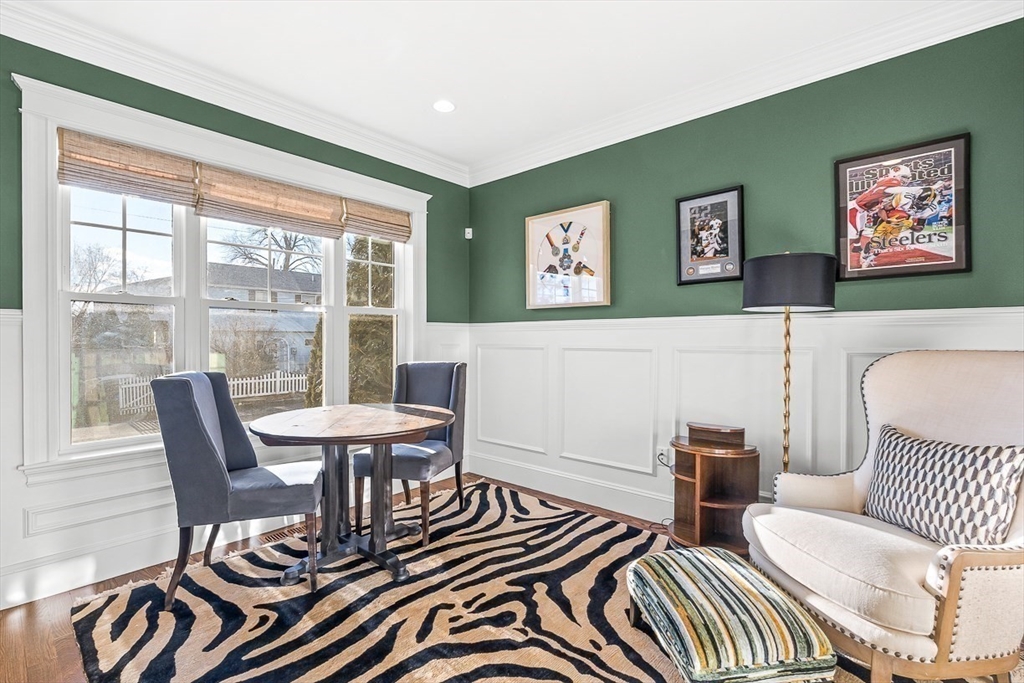 25 Cavanaugh Path Newton, MA 02459 - Photo 10 of 31 a view of a livingroom with furniture and a window