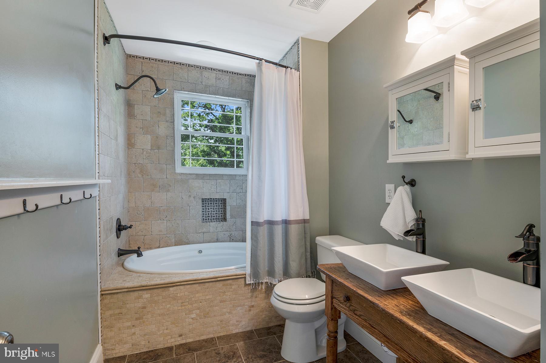 7736 West Shore Road Pasadena, MD 21122 - Photo 25 of 36 Remodeled upstairs bathroom has jetted tub