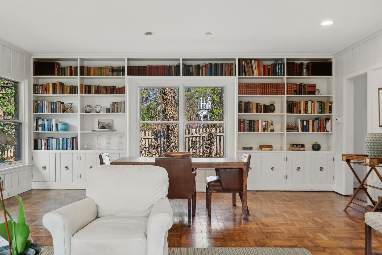 618 Ridge Road Winnetka, IL 60093 - Photo 11 of 29 a living room with furniture and a book shelf