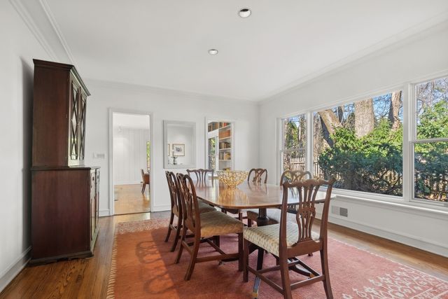 a kitchen with stainless steel appliances granite countertop a stove top oven a sink and a microwave