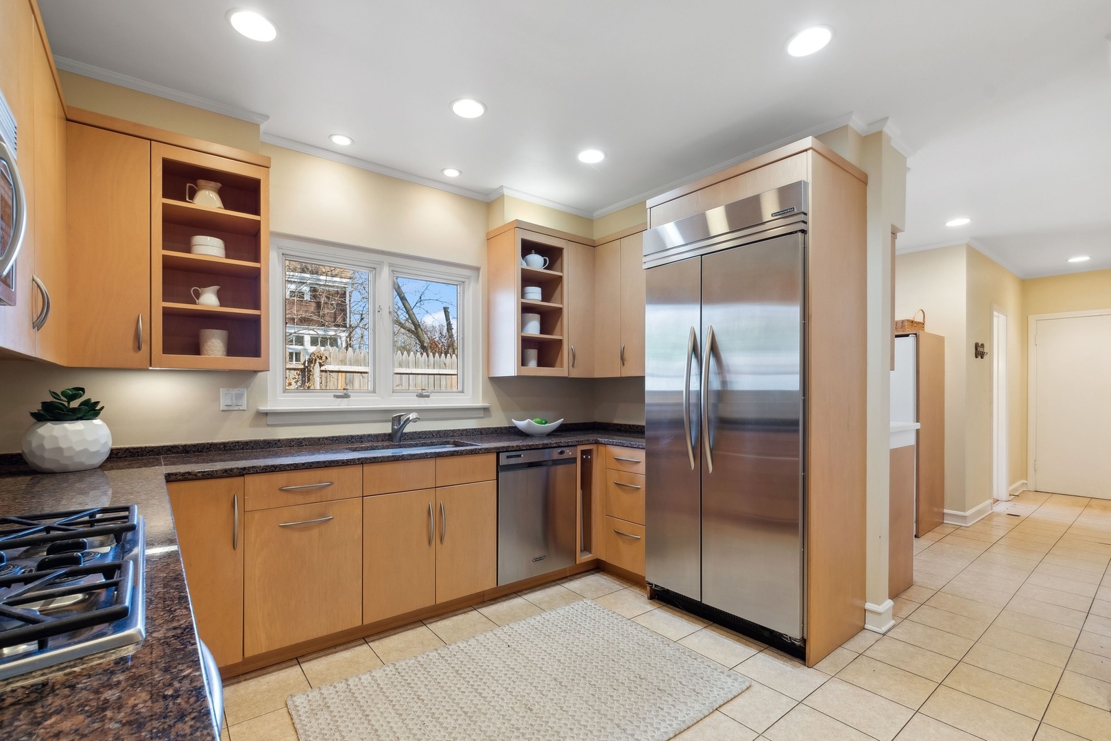 618 Ridge Road Winnetka, IL 60093 - Photo 17 of 29 a kitchen with stainless steel appliances granite countertop a refrigerator and a sink