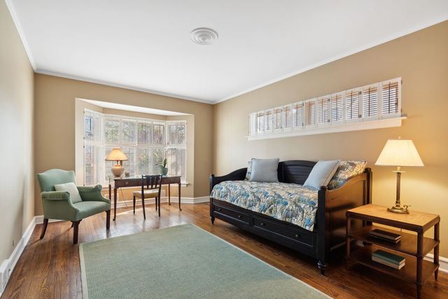 a view of a workspace with bookshelf