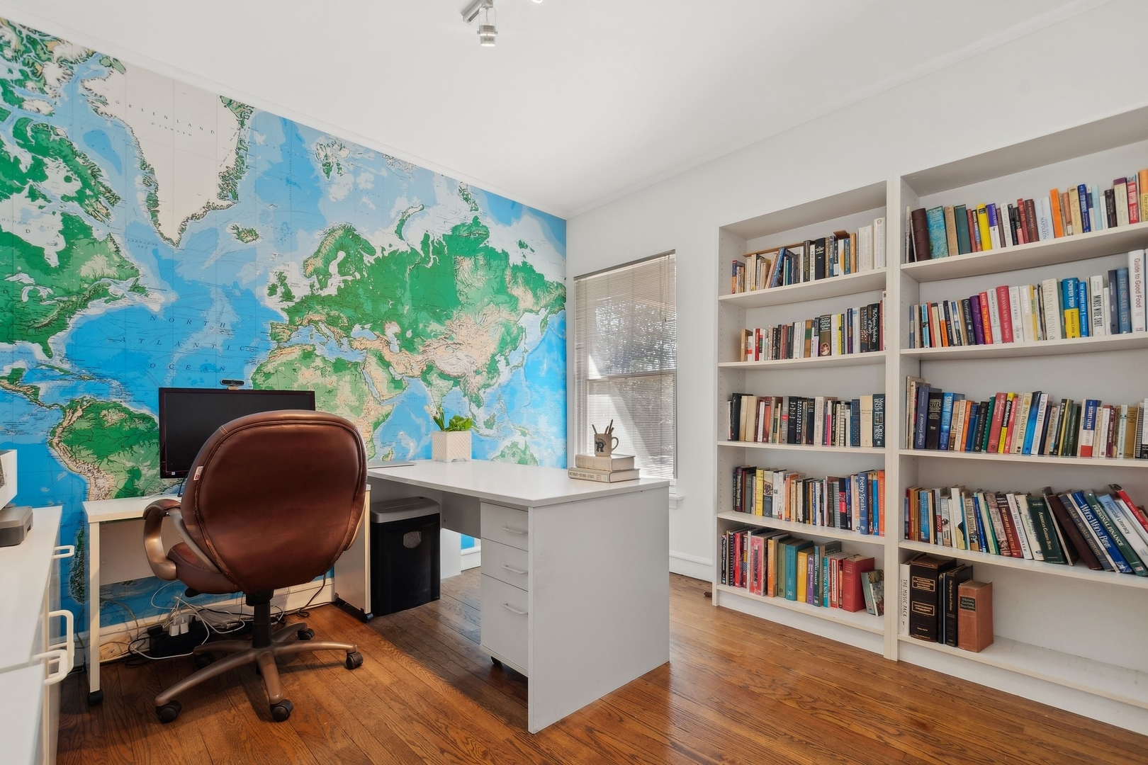 618 Ridge Road Winnetka, IL 60093 - Photo 24 of 29 a view of a workspace with bookshelf