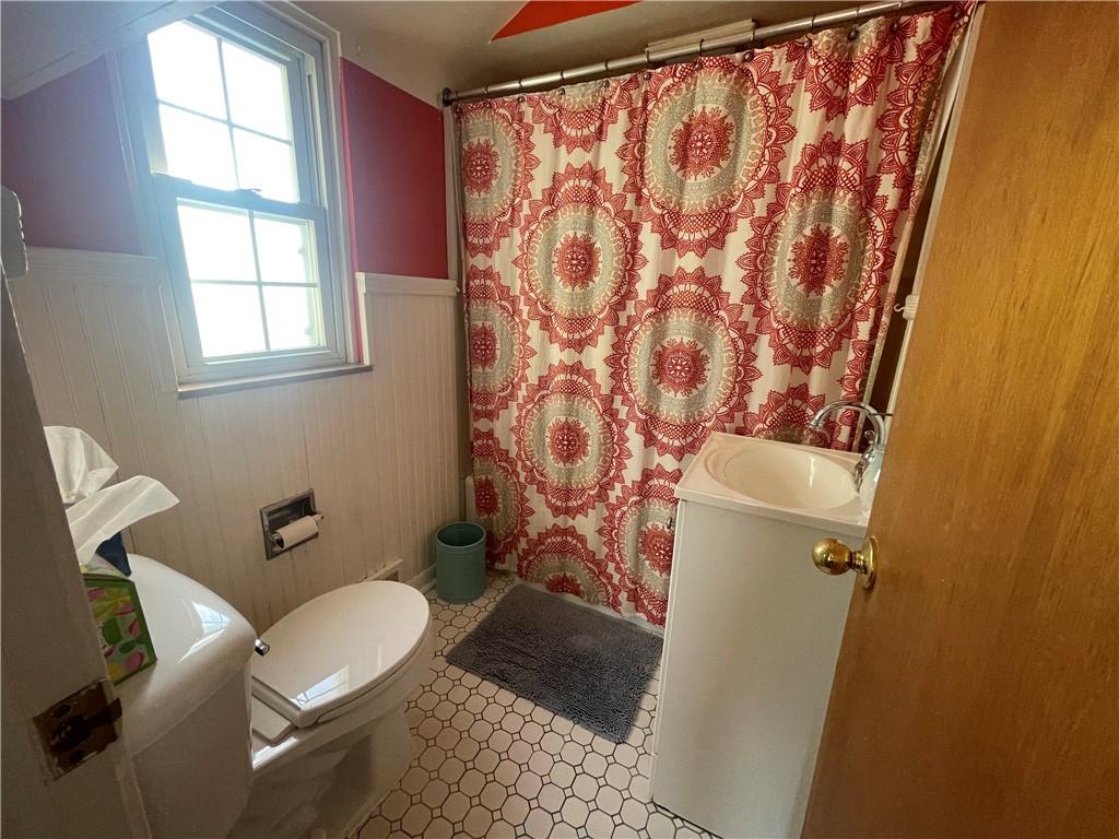 1018 Grandview Avenue Pittsburgh, PA 15237 - Photo 18 of 29 a white toilet sitting next to a shower curtain